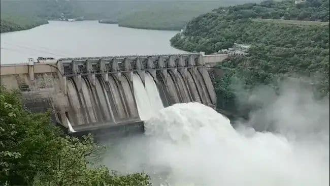 శ్రీశైలం జలాశయానికి వరద ప్రవాహం.. రెండు గేట్లు ఎత్తి నీటి విడుదల